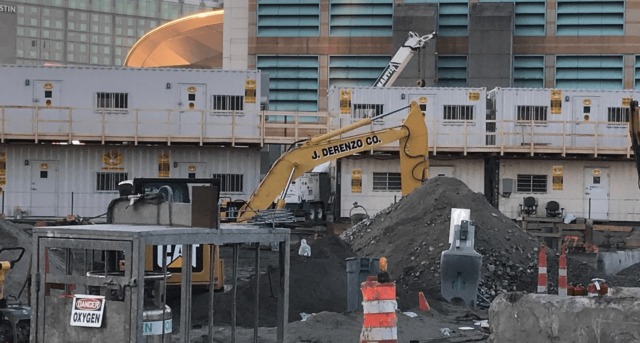 Office containers set up at active construction jobsite.