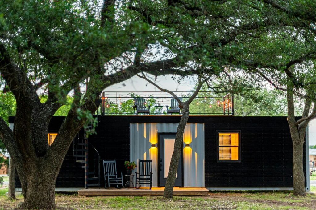 A shipping container being use as a small home.