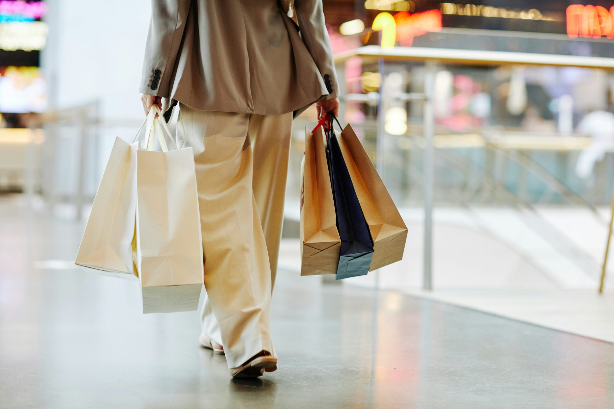 woman with shopping bags during peak season.