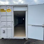 40-foot breakroom office container with exterior door and stair access.